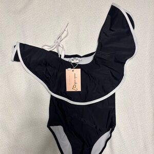 Size 4/5 year old girls one piece one shoulder swim suite